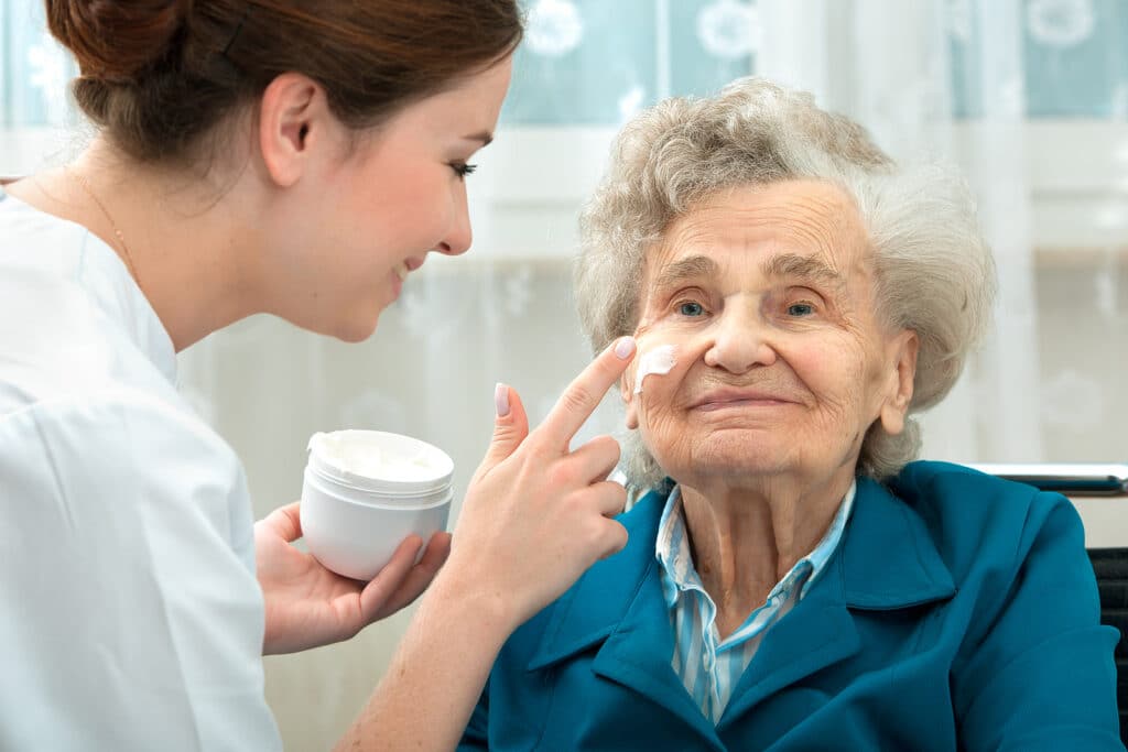 Personal care at home caregivers help seniors with many daily tasks including skin care.